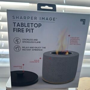 Sharper image table top fire pit NEVER OPENED
